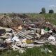 В Омской области расчистили очередную свалку на поле